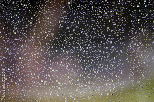 Water drops on the window, texture of water drops during rain.