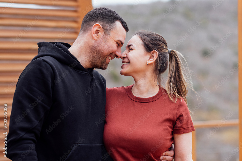 Attractive man and beautiful woman look at each other and smile Attractive man and beautiful woman look at each other and smile