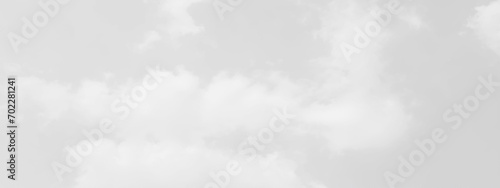  White cloud in the sky. View on a soft white fluffy cloud as background. Cloudy sky, white clouds, black background pattern. The gray cloud trendy photo. White sky image 