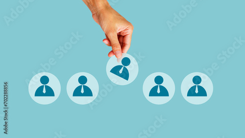 The concept of personnel management in the company. Dismissing an employees from a team. Demotion. Staff cuts. Human resources. Demote. Collage with the hand and images of workers photo
