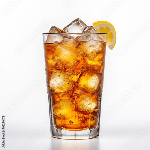 Cola in glass with ice and lemon on a white isolated background