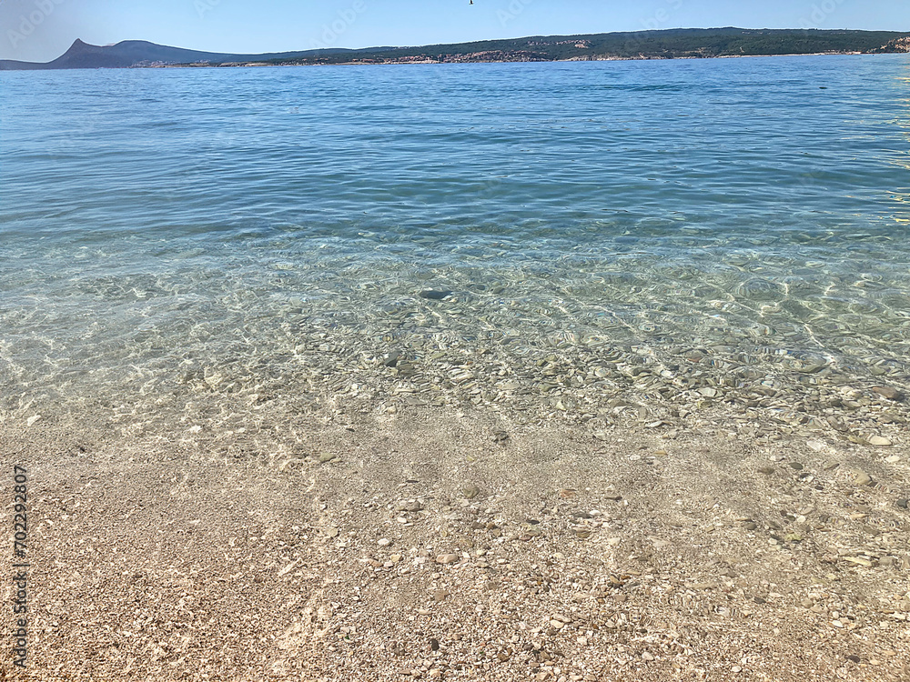 Beautiful seascape with clear sea water and sandy beach in summer Beautiful seascape with clear sea water and sandy beach in summer