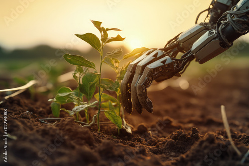 android robot hands planting seeds in soil photo