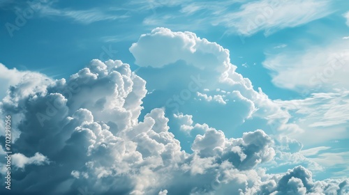 Sky-blue background with soft clouds, created for decorative purposes and providing ample room for copy. 