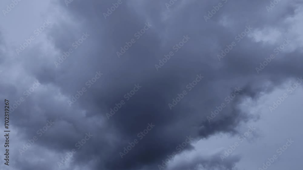 The dark cloud leaves and then another appears in the stormy landscape The dark cloud leaves and then another appears in the stormy landscape