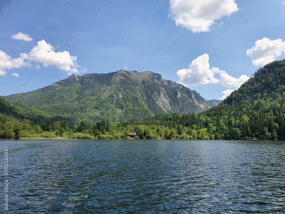 Calm and idyllic Lunzer See: View to Scheiblingstein in Lower Austria. Wonderful place for hiking, cycling and swimming in summer. Sunny day with blue sky