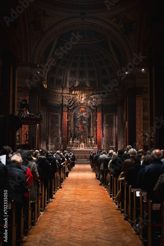 Join a midnight church service in London, where devotion fills the air. The congregants gather in quiet reflection, enveloped by the spiritual aura of the late-night sacred gathering.