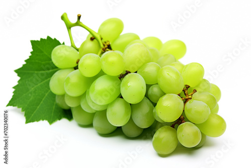 bunch of grapes with green berries, isolated on white background, leaves