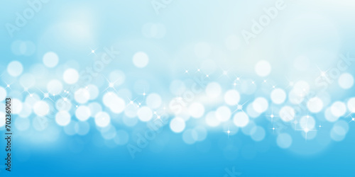 Summer Background with Blurred bokeh abstract bright light on sky blue.Vector illustration Defocus bokeh morning sunlights reflection from sea beach,Backdrop banner for holiday Vacation,Sale concept. photo
