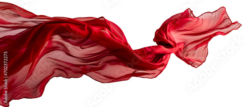 Flying red silk fabric. Waving satin cloth isolated on transparent background. photo