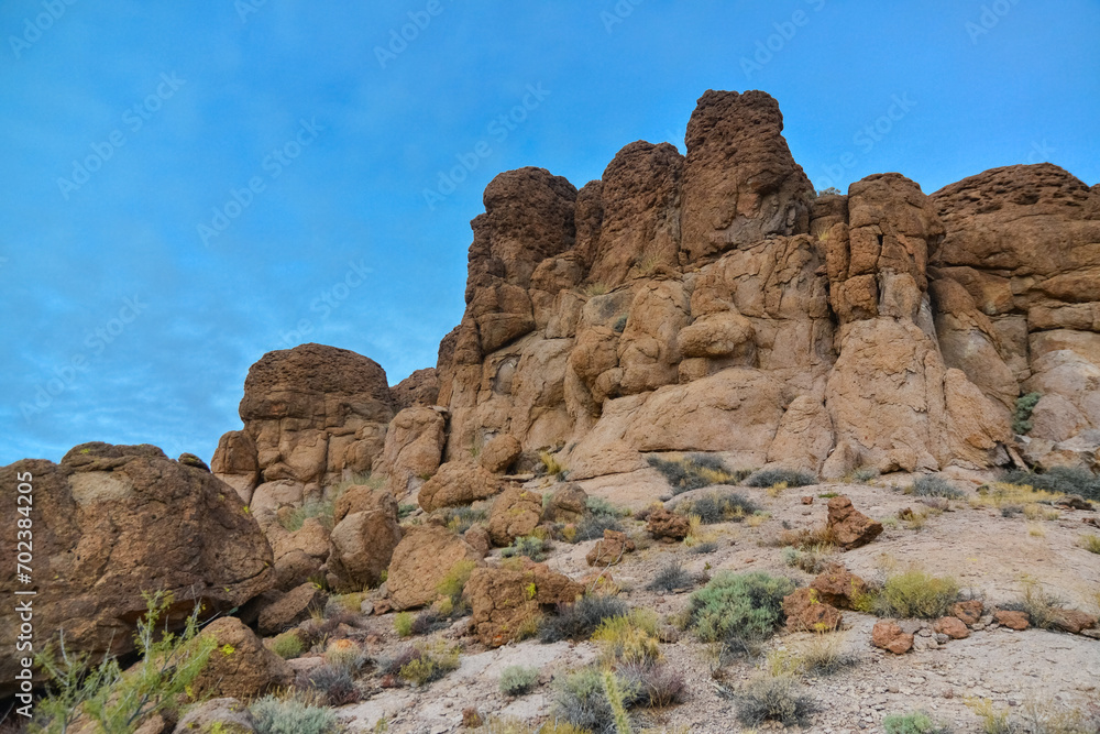 Mountain erosion formations of red mountain sandstones, desert landscape. Arizona