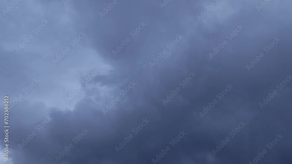 Huge dark cloud moves while covering the sky Huge dark cloud moves while covering the sky