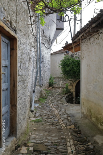 Narrow lane in the Mangalem historic  Ottoman-era district featuring cobbled floors  stone masonry walls. Berat-Albania-062