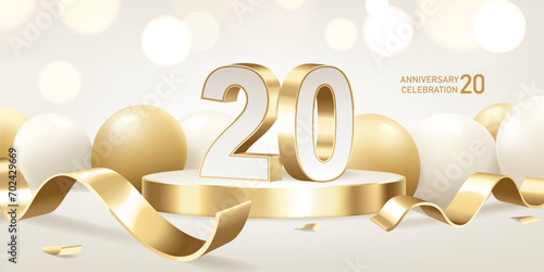 20th Anniversary celebration background. Golden 3D numbers on round podium with golden ribbons and balloons with bokeh lights in background. photo