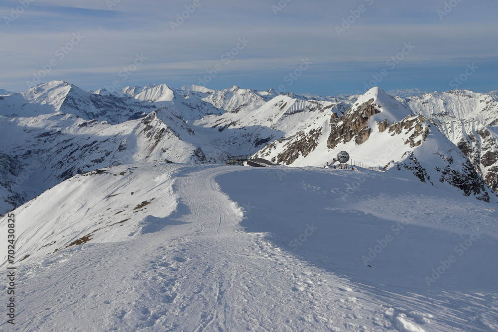 Sportgastein tourist area in Austria. Alpine snowy landscape. Amazing panorama of rocky mountains in winter. Snowy mountain peaks.