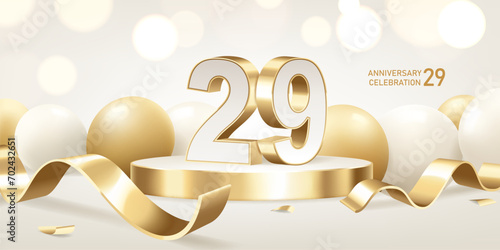29th Anniversary celebration background. Golden 3D numbers on round podium with golden ribbons and balloons with bokeh lights in background.