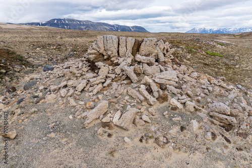 A volcanic bomb or lava bomb. Pyroclastic rocks from 1912 Novarupta volcanic eruption in Valley of Ten Thousand Smokes in Katmai National Park and Preserve, Alaska. photo