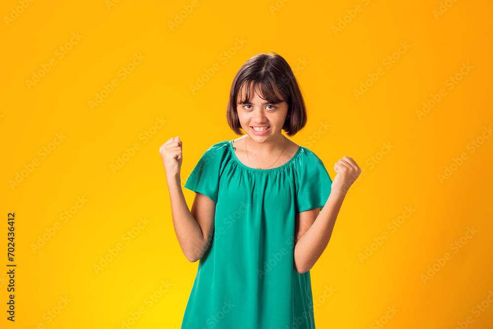 Sad kid girl over yellow background. Frustration concept Sad kid girl over yellow background. Frustration concept