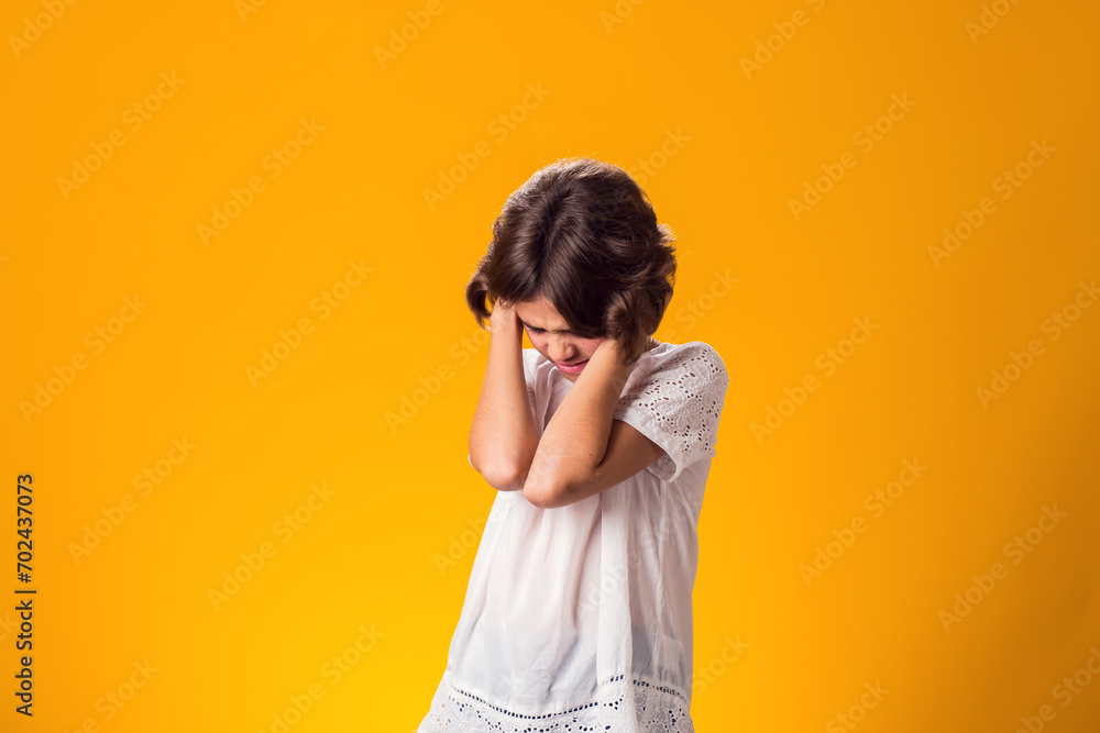 Girl ignoring stressful environment, closed ears with hands - obrazy, fototapety, plakaty 