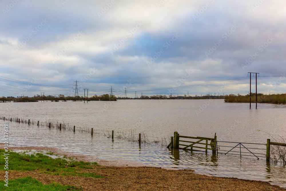 Storm Henk, the River Aire bursts its banks and floods the agricultural fields around the villages of Birkin and West Haddlesey near Selby, North Yorkshire in December 2023.  Horizontal. 