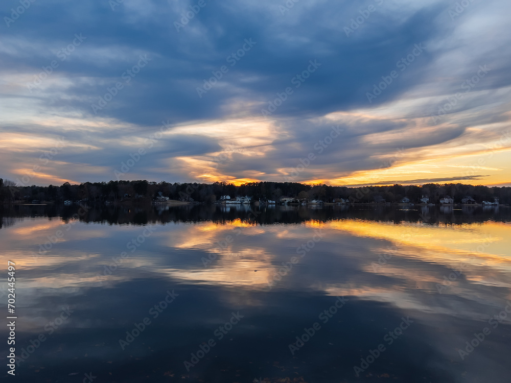 Beautiful lake with reflections in the water at sunset with spectacular colors. landscape photography