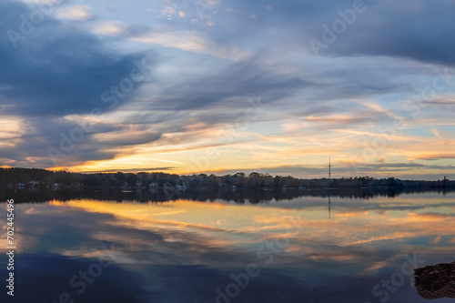 Beautiful lake with reflections in the water at sunset with spectacular colors. landscape photography