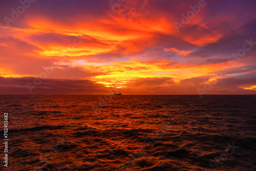朝焼けの空が映える海で20190907 photo