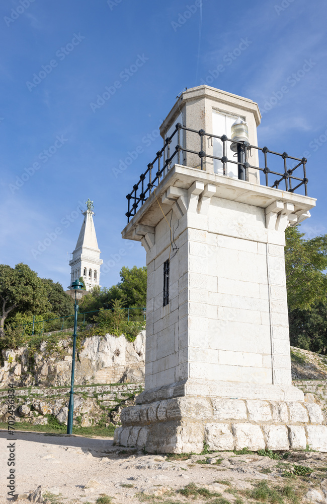 Rovinj lighthouse with the bell tower of the cathedral in the background, Croatia