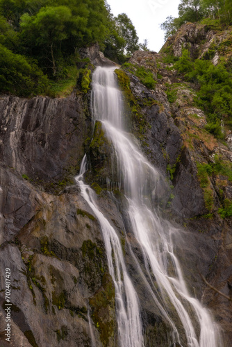Tall waterfall cascading over igneous rock - Aber Falls  Rhaeadr Fawr  North Wales