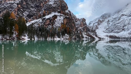 Autumn mountain landscape Lake Briers Pragser Wildsee Dolomites South Tyrol Italy. High quality 4k footage photo