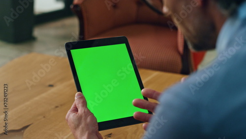 Director hand talking mockup tablet office. Unknown man gesturing chromakey tab photo