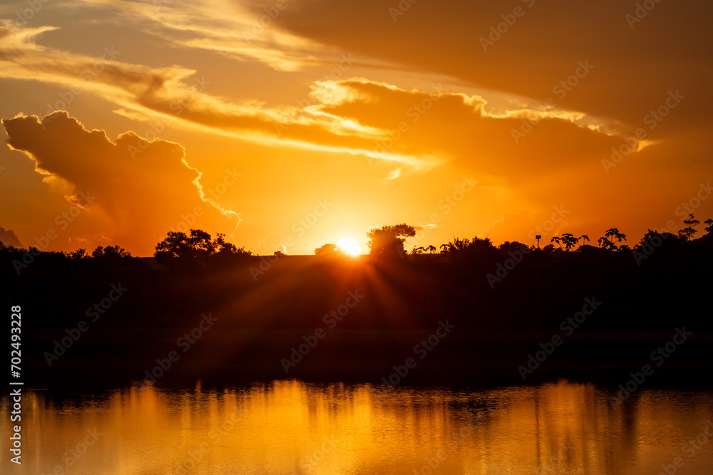 Obraz premium sunset over the river