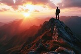 A person standing on top of a mountain, enjoying the breathtaking sunset. Perfect for travel and adventure themes