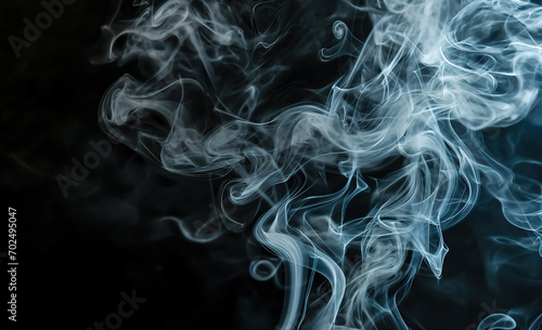 White smoke on black background. illuminated incense. Dark backdrop, graphic resource for montage, overlay or texture