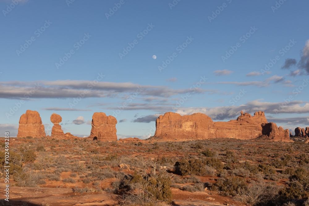 Rock formations with balanced rock in the desert