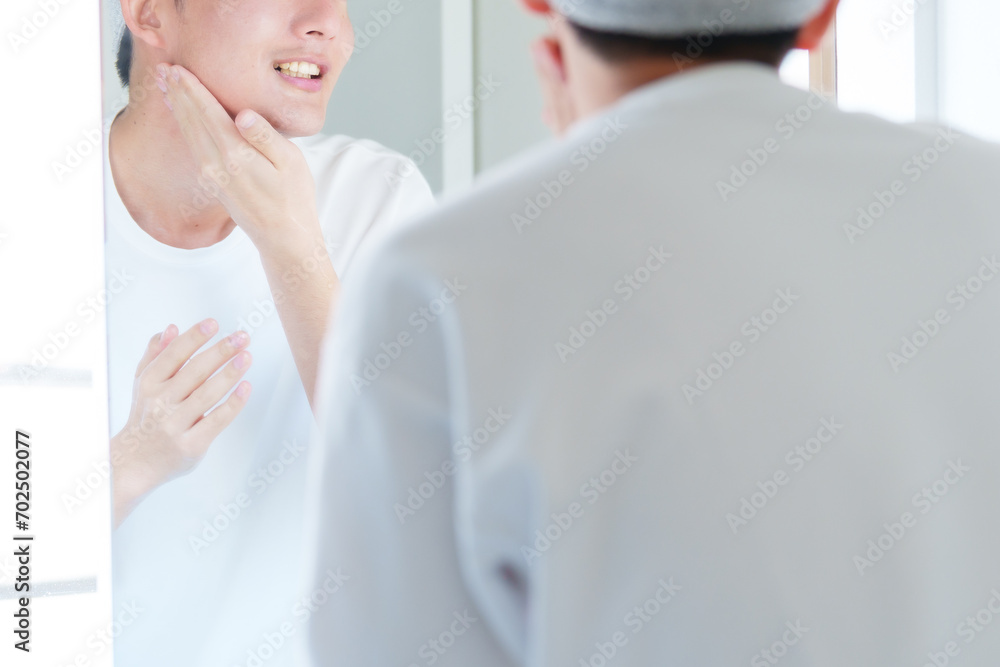 Obraz premium 洗顔をする男性 メンズビューティー コンセプト