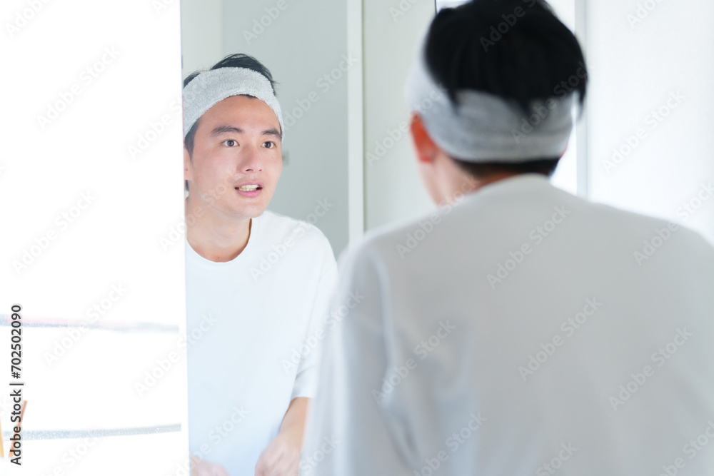 Obraz premium 洗顔をする男性 メンズビューティー コンセプト