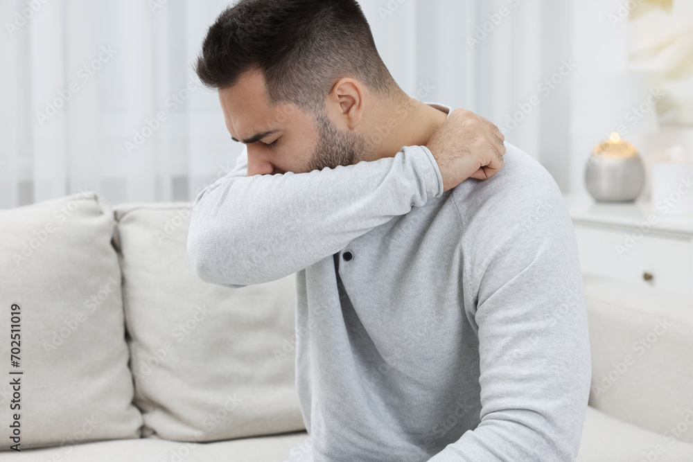 Sick man coughing at home. Cold symptoms Sick man coughing at home. Cold symptoms
