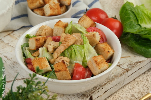Healthy Grilled Chicken Caesar Salad with Cheese and Croutons