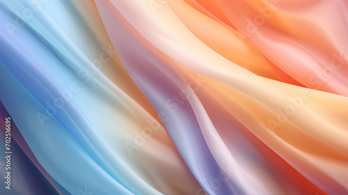 Waves of pastel-colored satin fabric creating a soft, dreamy background with a sense of gentle movement.