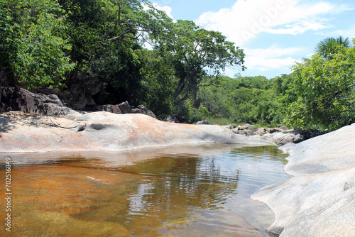 River in the heart of Brazil's central west, surrounded by large rocks. Beautiful landscape. photo