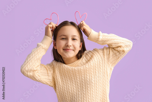 Happy little girl with deco...