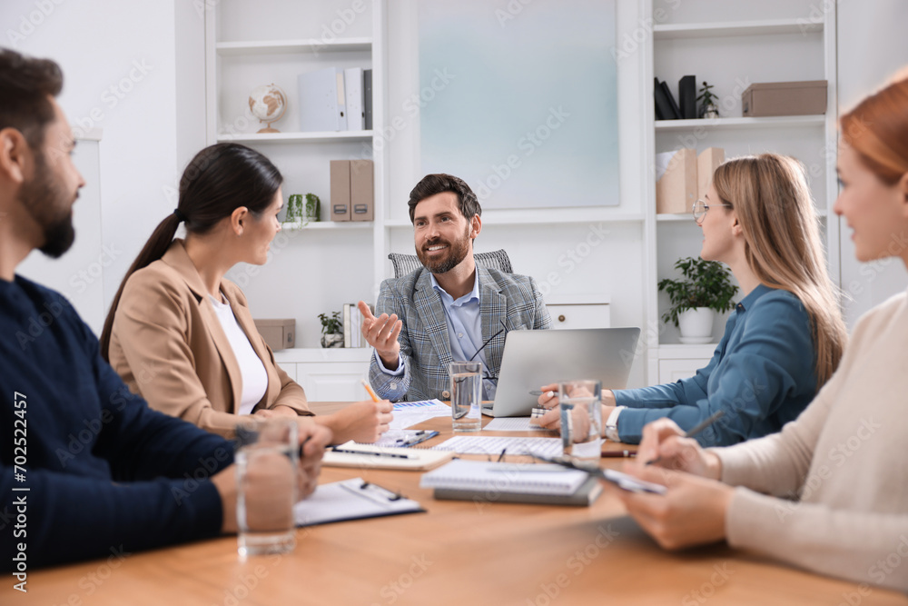 Obraz premium Team of employees working together in office