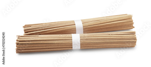 Uncooked buckwheat noodles (soba) isolated on white