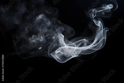 Smoke on black background. Panoramic view of the abstract fog. White cloudiness, mist or smog moves on black background. Beautiful swirling gray smoke.Dark backdrop