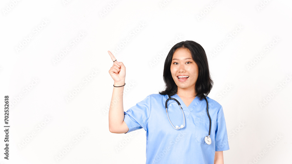 Young Asian female doctor pointing side copy space isolated on white background Young Asian female doctor pointing side copy space isolated on white background