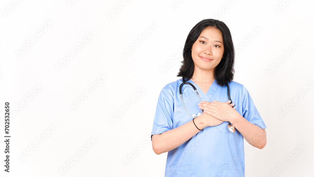 Young Asian female doctor hand on chest grateful gesture isolated on white background Young Asian female doctor hand on chest grateful gesture isolated on white background