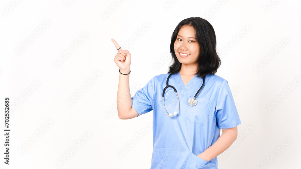 Young Asian female doctor pointing side copy space isolated on white background Young Asian female doctor pointing side copy space isolated on white background