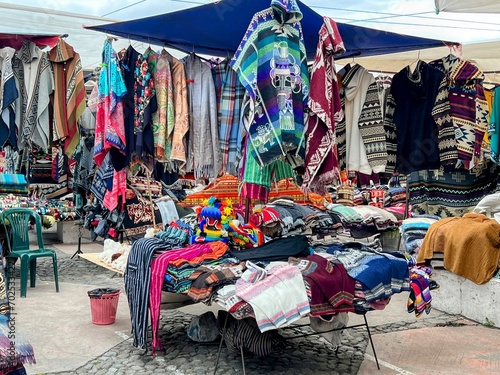 Otavalo, Ecuador  10-18-2023  Views of the colorful indigenous market which includes handmade items like ponchos, sweaters, and shawls. photo