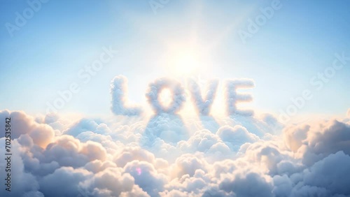 LOVE spelled out by clouds against a blue sky, with a soft glow from the sun, captures love's serene and fleeting essence photo